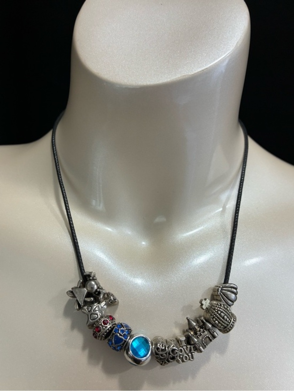 Black Cord Necklace with Silver Travel Themed Chunky Charms Blue and Red Accents